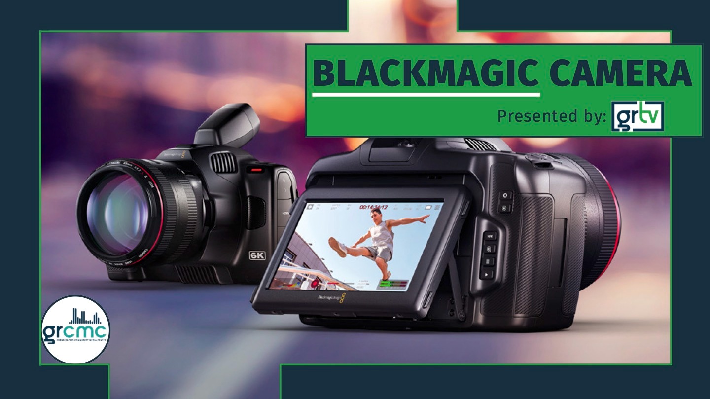 A front and back view of a compact camera, showing the lens and monitor screen with the word "Blackmagic Camera" in the corner