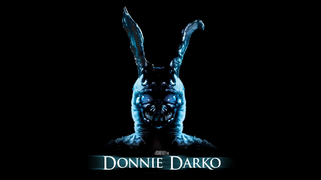 A black background with a creepy blue bunny with big eyes. There's text that reads Donnie Darko
